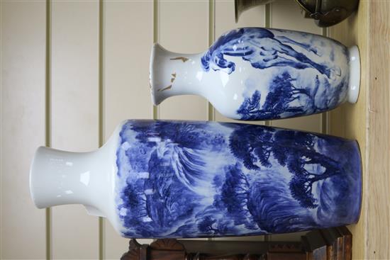 A Chinese blue and white baluster vase, decorated with a landscape, Largest 17.25in.